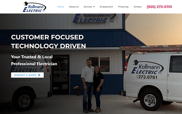 A man and woman stand in front of a building with two vans displaying "Kollmann Electric" logos, embodying top-notch electrical services. Their site ranks among the best electrician websites, inviting you to request a quote with its seamless design and effective electrician SEO.