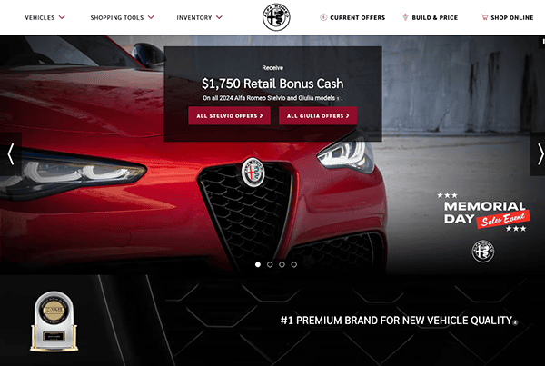 Close-up view of a red alfa romeo giulia's front grille and headlights, with a memorial day sales event advertisement overlay.