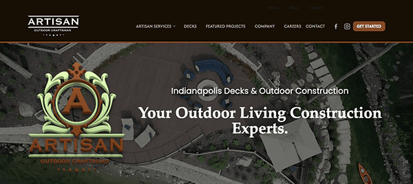 Artisan Outdoor Craftsman website homepage featuring a background image of a deck and garden area with the company logo, services, project information, and contact details.
