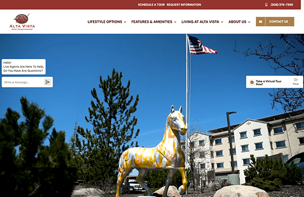 A painted horse statue stands in front of a building with an American flag on a pole. The building has a sign reading "Alta Vista" and a "Schedule a Tour" button at the top.
