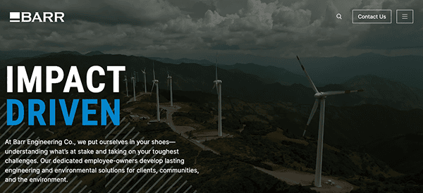 Website header image of a wind farm with multiple turbines on a hilly landscape, under a cloudy sky, with the text "impact driven" and company logo on the top left.