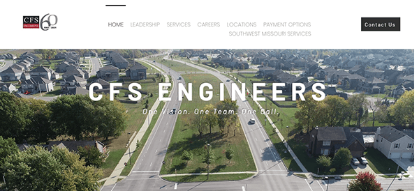 Aerial view of a suburban area with the logo and name "cfs engineers" displayed on a website header, featuring navigation menus and a contact link.