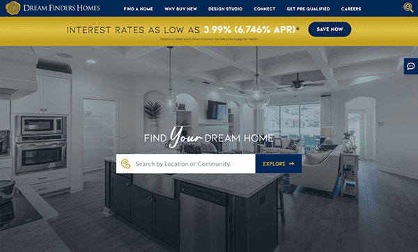 A real estate website homepage featuring a modern kitchen and living room. The screen displays a search bar with a call to "Find Your Dream Home" and a promotional banner for interest rates starting at 3.99% APR.