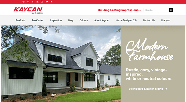 Screenshot of the Kaycan website showing a large modern farmhouse with text about rustic, cozy, vintage-inspired, white or neutral colors. The navigation menu includes links to products, pro center, and more.