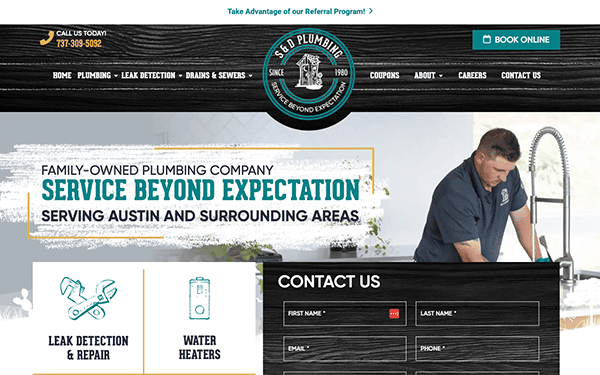 Screenshot of a plumbing company's homepage, featuring a photo of a plumber at work. The text highlights their services, contact information, and a family-owned aspect, with a call-to-action to book online.