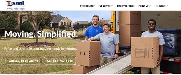 Three men in blue and grey shirts smile while handling cardboard boxes and a moving truck in a suburban neighborhood. Text: "Moving. Simplified. Price and schedule your moving needs in minutes. Call 866-767-5348.