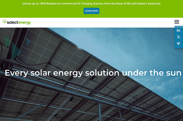 A view of solar panels with the text, "Solect Energy: Every solar energy solution under the sun." A banner at the top offers rebates on commercial EV charging stations in Massachusetts.