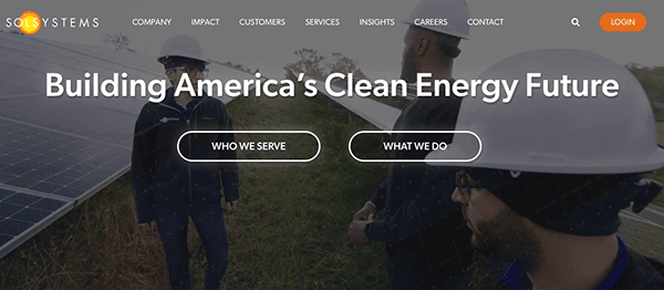 Three people in hard hats stand near solar panels under a cloudy sky. Text on the image reads, "Building America's Clean Energy Future" with buttons below saying "Who We Serve" and "What We Do.