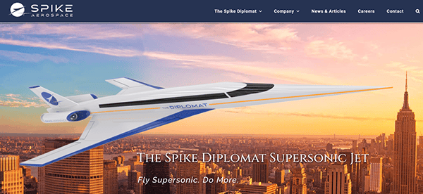 A digital image of the spike diplomat supersonic jet flying over a city skyline at sunset, with promotional text "fly supersonic. do more.