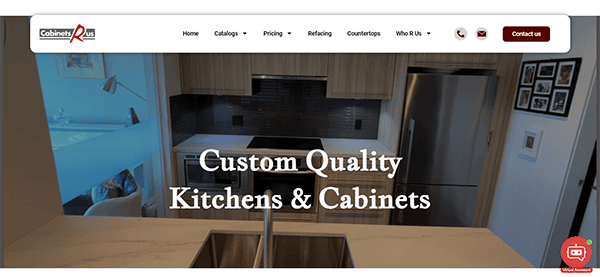 Screenshot of a website's homepage featuring custom kitchen and cabinet design services. The page includes navigation options and a contact button. Text on screen reads, "Custom Quality Kitchens & Cabinets.