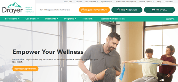 A physical therapist assists a woman with a leg exercise while another person performs a shoulder stretch in the background. Text reads "Empower Your Wellness" and includes options to request an appointment.