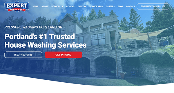 Screenshot of a website advertising house washing services in Portland, OR. The homepage features a large house and contact details, highlighting "Portland's #1 Trusted House Washing Services.