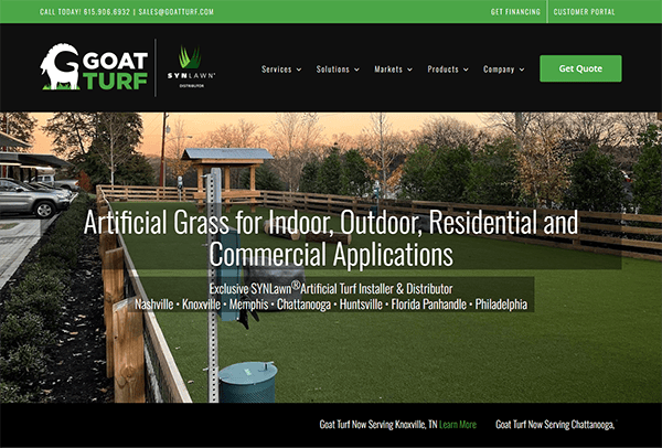 Screenshot of Goat Turf website highlighting artificial grass services for various applications. Features a large photo of a yard with artificial grass, company contact info, and service locations.