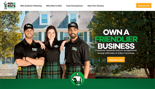 Three people stand outside wearing black polo shirts and green plaid kilts. The text reads "Own a Friendlier Business" with information about the Men in Kilts franchise and a request info button.