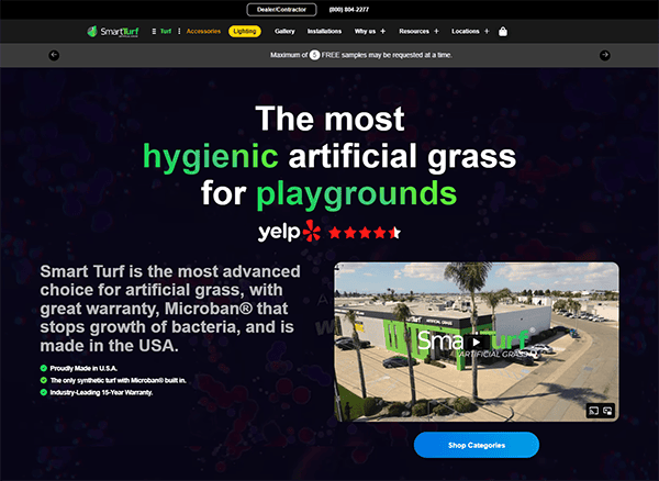 Website screenshot featuring an advertisement for Smart Turf, a company offering hygienic artificial grass for playgrounds with advanced Microban technology. Includes a video thumbnail and call-to-action button.