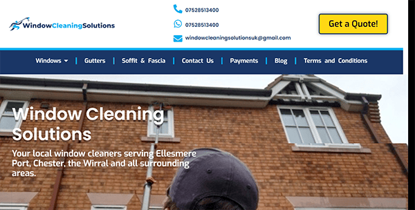 Screenshot of the Window Cleaning Solutions website, featuring a brick building in the background and contact details at the top. A call-to-action button labeled "Get a Quote!" is in the top right corner.