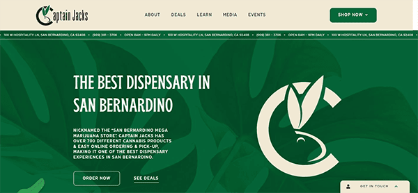 Website of Captain Jacks, a dispensary in San Bernardino, featuring a banner with text promoting it as the best dispensary in the city and offering over 200 cannabis products. Options to "Order Now" or "See Deals" are visible.