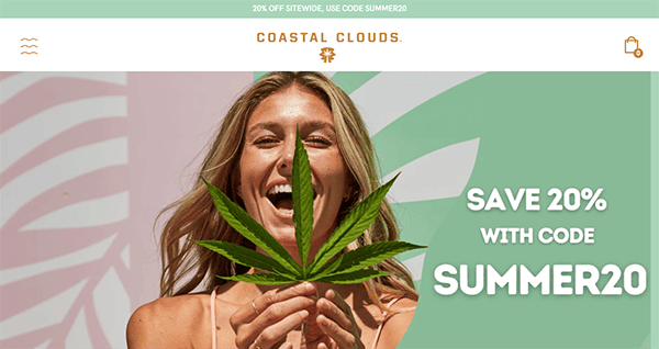 A woman holds a large cannabis leaf in front of her smile. Background includes the text "Save 20% with code SUMMER20" and "COASTAL CLOUDS" branding.