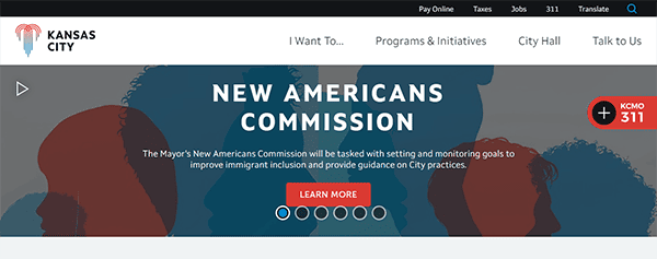 Screenshot of a Kansas City government webpage announcing the New Americans Commission, tasked with improving immigrant inclusion. Includes a learn more button and city service links at the top.