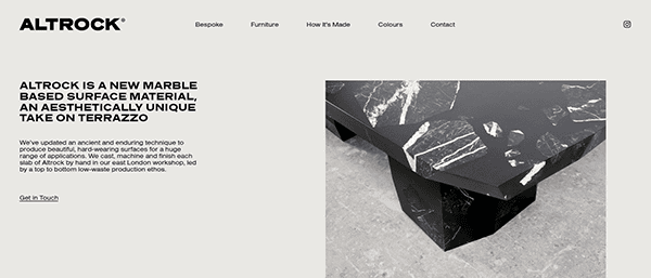 Screenshot of Altrock's website showcasing a black marble-based surface with white veining. The webpage features navigation links (Bespoke, Furniture, Home, How It's Made, Colours, Contact) and a text description.