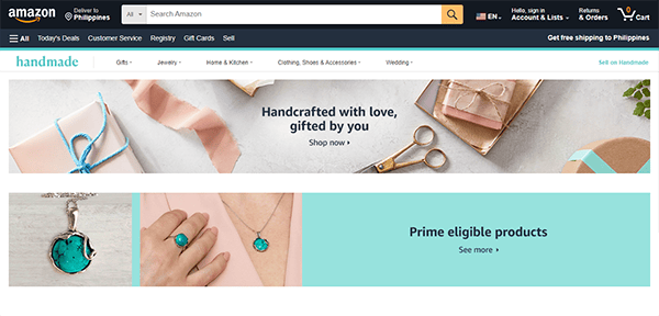 Amazon Handmade website page showcasing a section for handcrafted gifts with a turquoise pendant and an invitation to explore Prime eligible products.