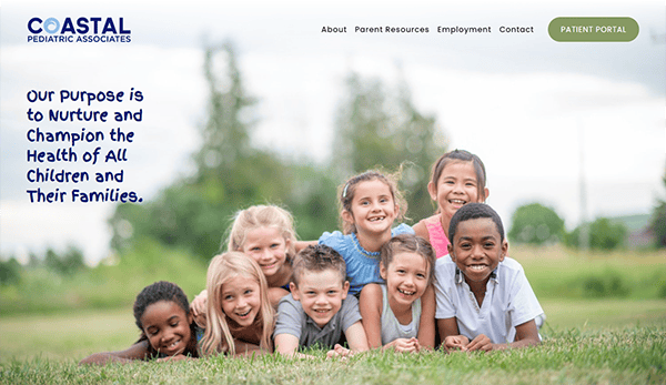 A group of children lying on the grass, smiling at the camera. Text on the image reads, "Our purpose is to nurture and champion the health of all children and their families." "Coastal Pediatric Associates" is shown.