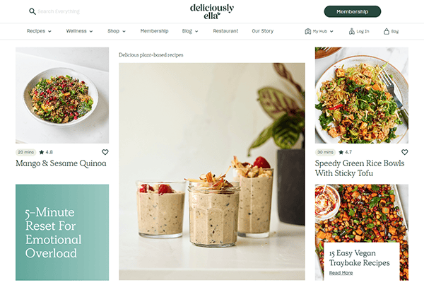 Website interface displaying plant-based recipes including "Mango & Sesame Quinoa," "Speedy Green Rice Bowls With Sticky Tofu," and "15 Easy Vegan Traybake Recipes." A "5-Minute Reset For Emotional Overload" is also shown.