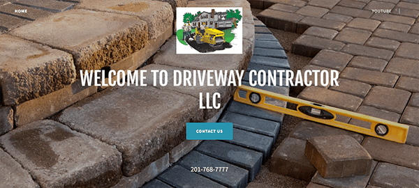 Website homepage for Driveway Contractor LLC featuring an image of paving stones, a spirit level, and a contact button.