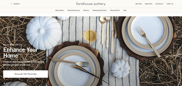 Website homepage of Farmhouse Pottery displaying a rustic outdoor table setting with plates, cutlery, and pumpkins. Top navigation bar includes links to best sellers, pottery, tabletop & kitchen, and more.