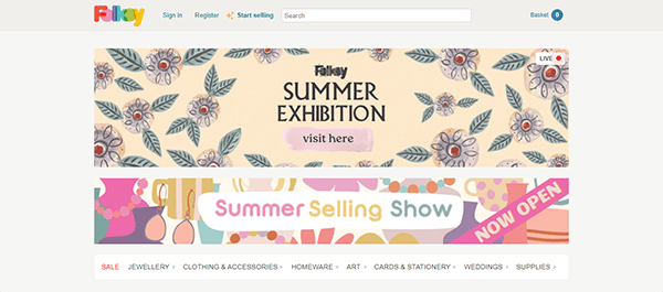 A webpage showing the Folk Summer Exhibition banner at the top, followed by the Summer Selling Show banner. Navigation options at the top and product categories listed at the bottom.