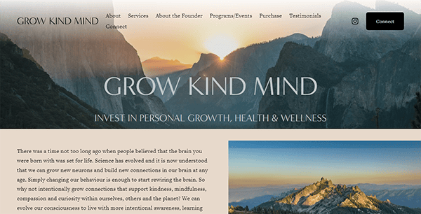 Website for "Grow Kind Mind" with a background of a scenic mountain range, and text promoting personal growth, health, and wellness. A paragraph discusses brain connections, learning, and mindfulness.