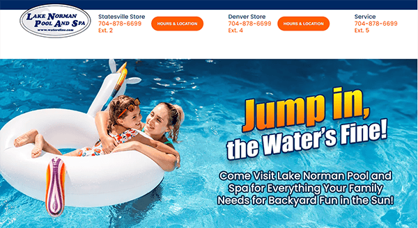 A child and an adult float on an inflatable swan in a swimming pool. Text reads "Jump in, the Water’s Fine! Come visit Lake Norman Pool and Spa for everything your family needs for backyard fun in the sun!.