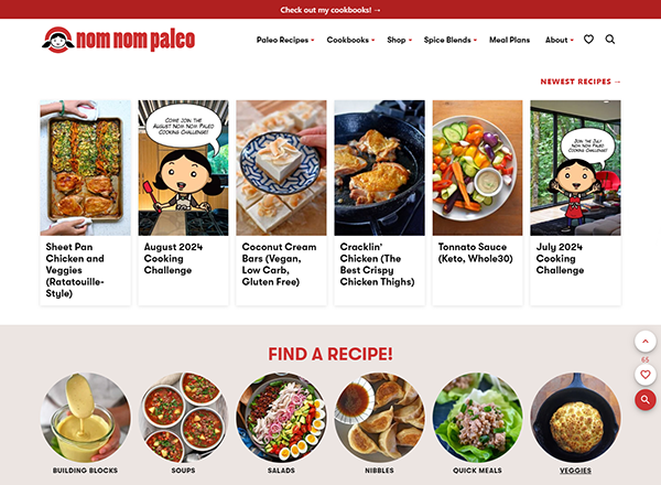 Website homepage of Nom Nom Paleo featuring the latest recipes, cooking challenges, and a recipe search section. The top navigation includes links to recipes, cookbook, shop, spice blends, and meal plans.