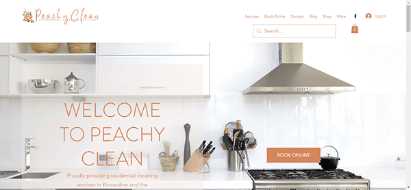 A kitchen-themed website homepage for "Peachy Clean," offering residential cleaning services. The page features a search bar, login option, and a large "Book Online" button.