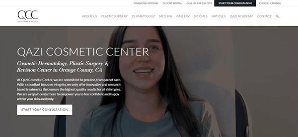 Homepage of Qazi Cosmetic Center showing a woman smiling and text about their services in cosmetic dermatology, plastic surgery, and revision care.