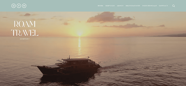 A boat sails on calm waters during sunset. The sky is a gradient of orange and yellow with scattered clouds. The image features the Roam Travel Company website interface.