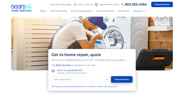 A technician in uniform repairs a washing machine. The web page is advertising Sears Home Services for in-home repairs with a phone number and an option to schedule an appointment online.