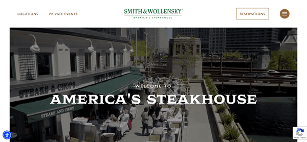 Outdoor seating area of Smith & Wollensky near a waterway with people dining. A banner reads "WELCOME TO AMERICA'S STEAKHOUSE." Website features navigation links for Locations, Private Events, and Reservations.