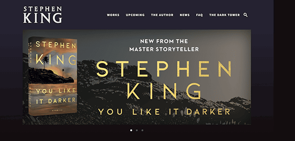 Website homepage showcasing Stephen King's book "You Like It Darker" with the text "New from the master storyteller Stephen King." The site menu includes sections like Works, Upcoming, and The Author.