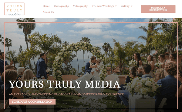 Outdoor wedding ceremony with a flower arch, palm trees, and guests seated. The bride and groom stand facing each other. Text overlays promote wedding photography and videography services by Yours Truly Media.