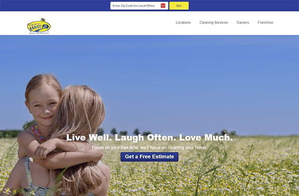 Two girls hugging in a field of flowers on a website's homepage. The site offers cleaning services with the tagline "Live Well. Laugh Often. Love Much." and a button for a free estimate.