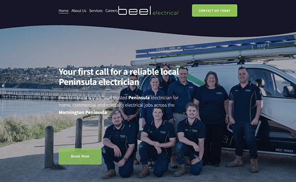 Group of electricians posing in front of a branded van with a scenic background. Text promotes Peninsula electrical services.