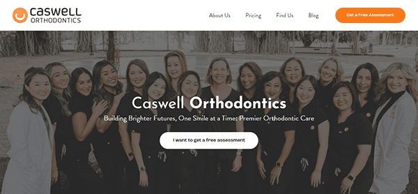 A group of orthodontic professionals stand together smiling in an outdoor setting. The text on the image reads "Caswell Orthodontics: Building Brighter Futures, One Smile at a Time! Premier Orthodontic Care.