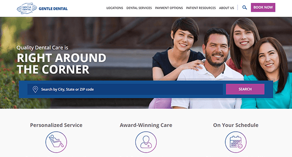 Family sitting and smiling on a dental website homepage. Text reads, "Quality Dental Care is Right Around the Corner." Search bar below text and icons highlight personalized service, award-winning care, and scheduling options.