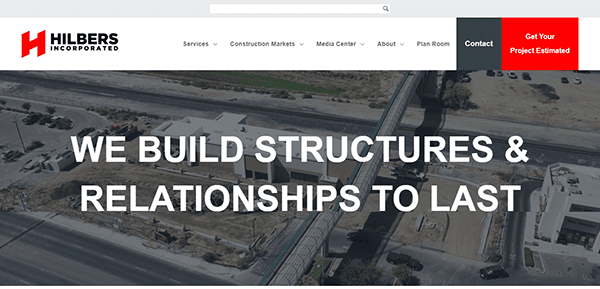 Screenshot of the Hilbers Incorporated website homepage showing a construction site and the slogan "We Build Structures & Relationships to Last" prominently displayed.