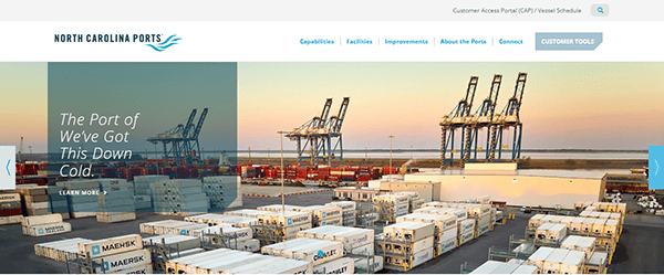 Wide-angle view of the North Carolina Ports showing container stacks, large cranes, and shipping containers with a sunset background. Text reads "The Port of We've Got This Down Cold.