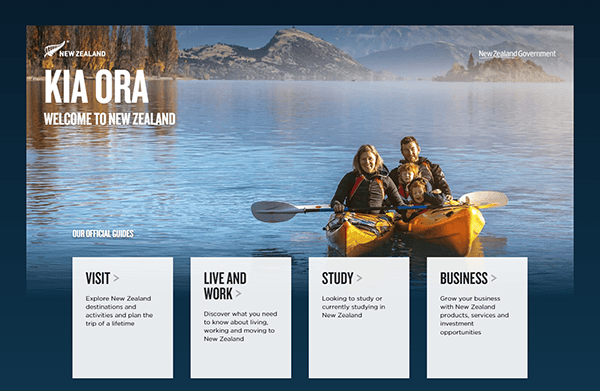 A family in a kayak smiles on a serene lake with mountains in the background. The text covers 'Visit,' 'Live and Work,' 'Study,' and 'Business' opportunities in New Zealand.