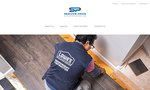 A contractor, wearing a Lowe's vest, installs wooden flooring in a room. The Service Pros logo and navigation bar are visible above.