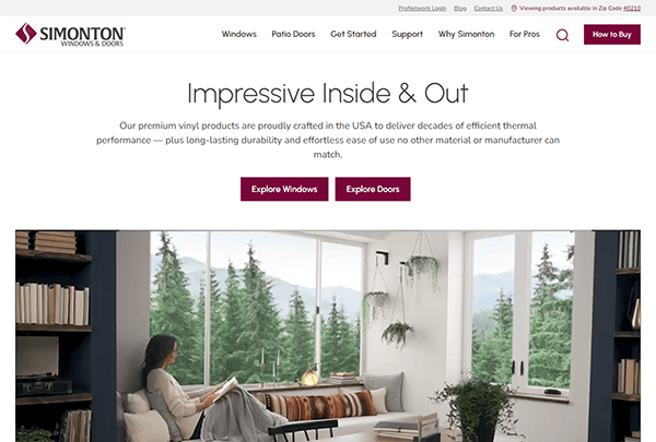 Simonton Windows & Doors website homepage featuring an image of a cozy room with large windows, a seated person reading, and views of a wooded landscape. Prominently displayed: "Impressive Inside & Out.