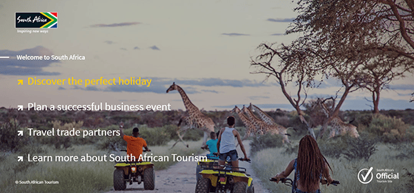 A group of people on quad bikes observe giraffes in a natural landscape under a clear sky. Text reads: "Welcome to South Africa - Discover the perfect holiday.